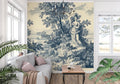 Classic blue Toile de Jouy wallpaper in an elegant dining room with natural light streaming through French windows