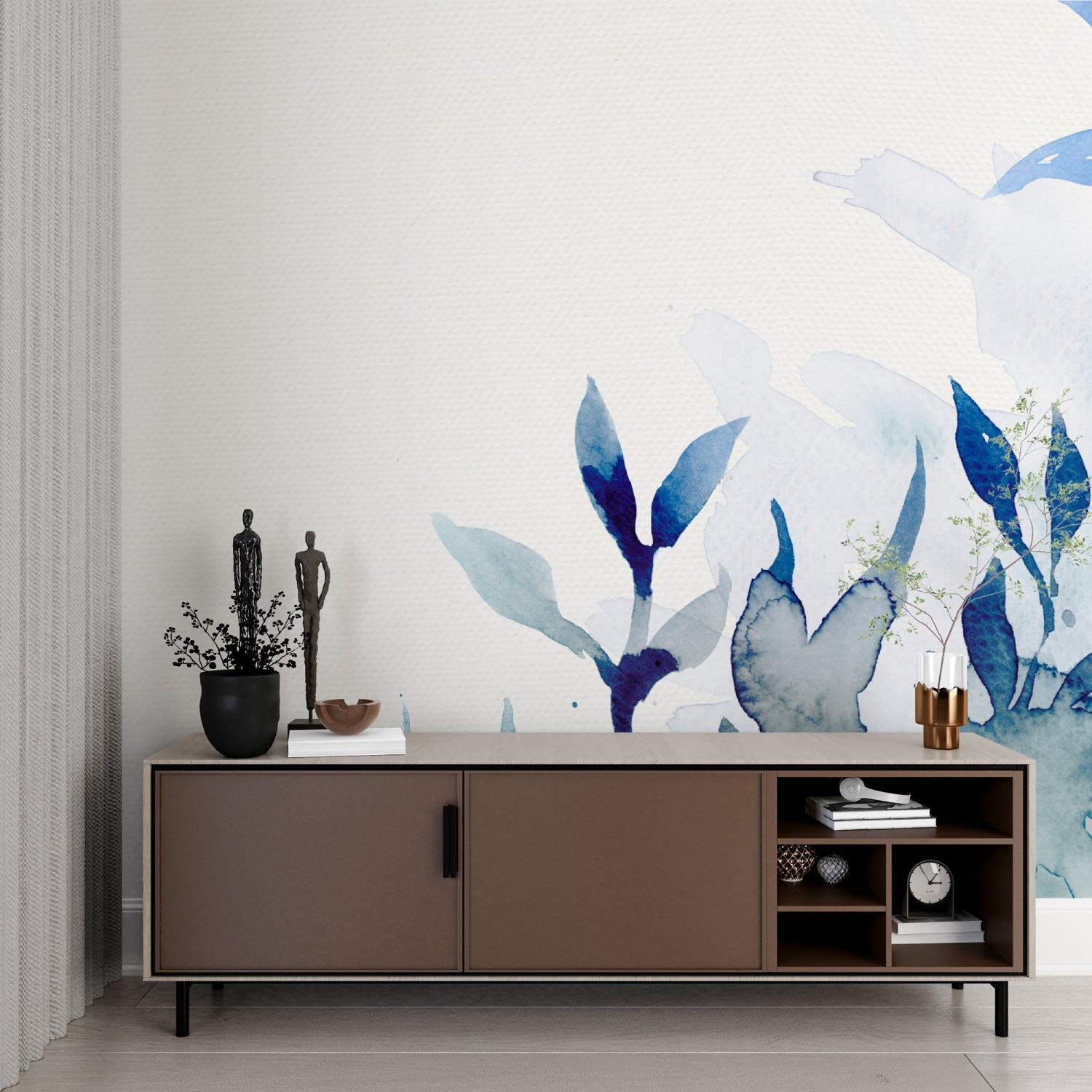 Blue watercolor floral wallpaper in a bright modern living room creating a peaceful atmosphere