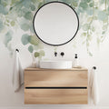Eucalyptus watercolor wallpaper creating a serene atmosphere in a modern bathroom with white fixtures and natural wood accents