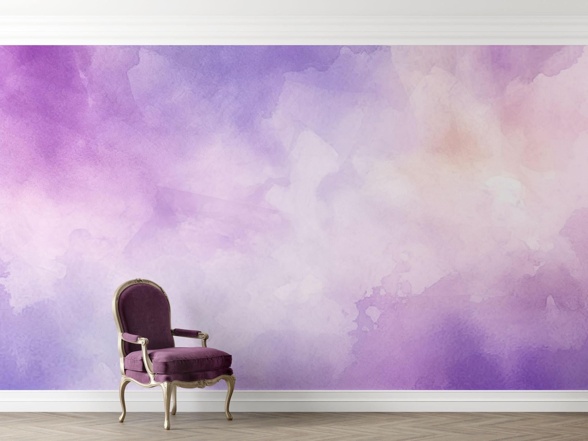 Watercolor purple wall mural adding soft color to a cozy nursery space