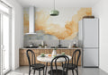 Golden cloud watercolor wallpaper in a bright modern living room with minimal furniture