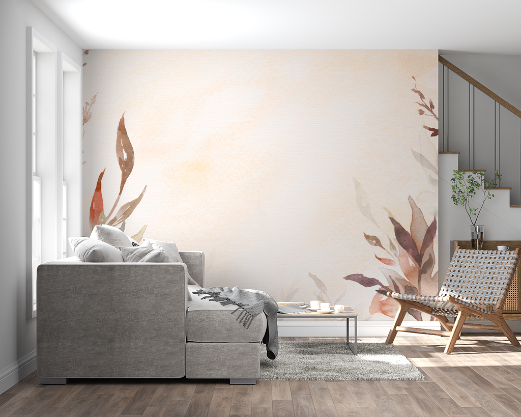 Watercolor leaf wallpaper in modern living room showing terracotta tones against white furniture