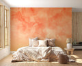 Watercolor orange abstract mural in modern living room with minimalist furniture and natural light