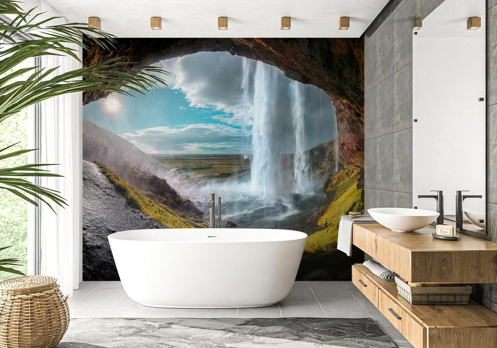 Waterfall cave mural bringing drama to a modern living room with floor-to-ceiling nature vista effect