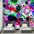 Western desert wallpaper creating a cozy atmosphere in a kid's bedroom with toy horses and cowboy decor