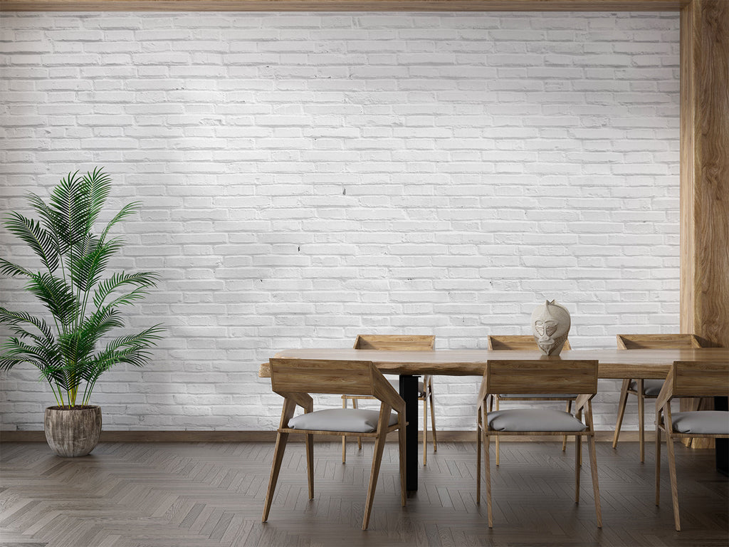White brick mural wallpaper creating a sleek backdrop in a modern living room with natural light