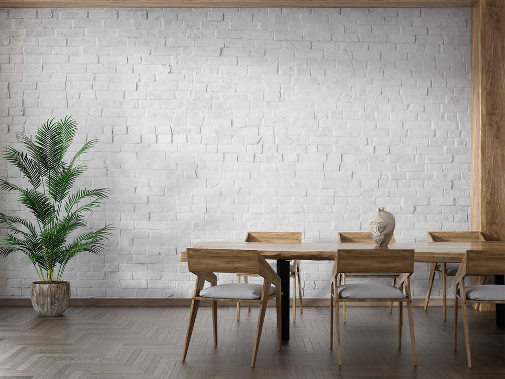 Industrial style kitchen with white brick wall mural and stainless steel appliances