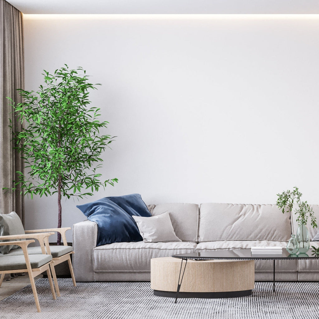 White minimalist wall mural in a bright modern living room creating an airy, open atmosphere