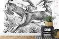 Wildlife wallpaper creating modern contrast in minimalist living room with grey sofa and natural light