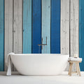 Coastal wood wallpaper with blue and white stripes creating a beach house feel in a modern living room