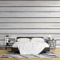White wood plank wallpaper creating a bright, airy feel in a modern living room with natural light