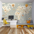 World map wallpaper in bright kids bedroom showing animals and hot air balloons